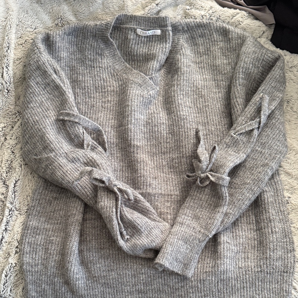 Chic Gray V-Neck Sweater with Bow Accents